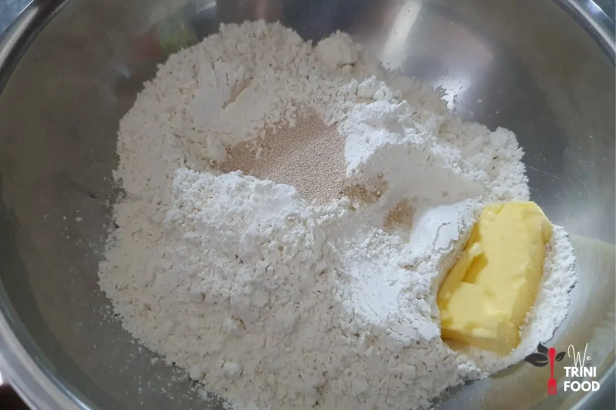 mixing dough for aloo pie
