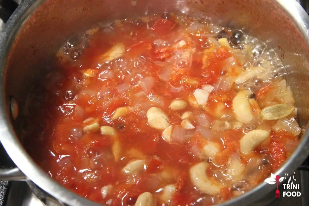 boil tomatoes, cashews and spices