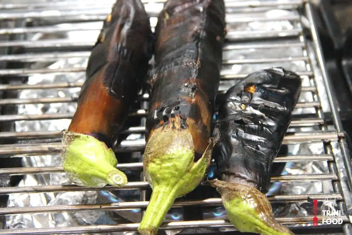 roasting eggplants on open flame
