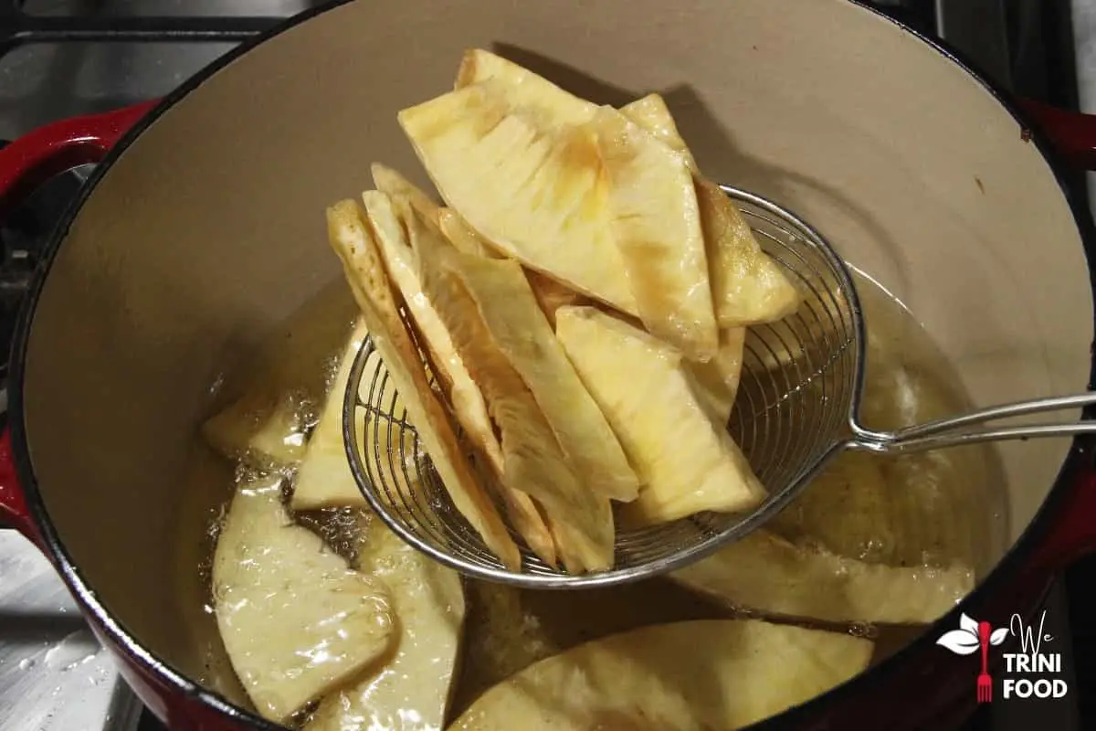 fried breadfruit chips over oil