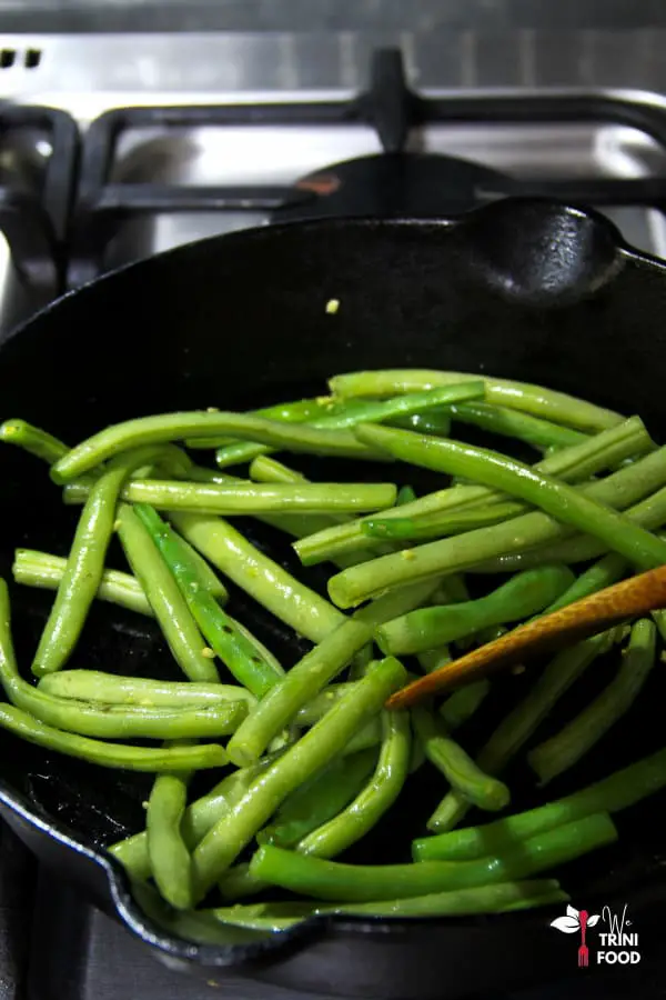 sauteeing green beans in cast iron pot