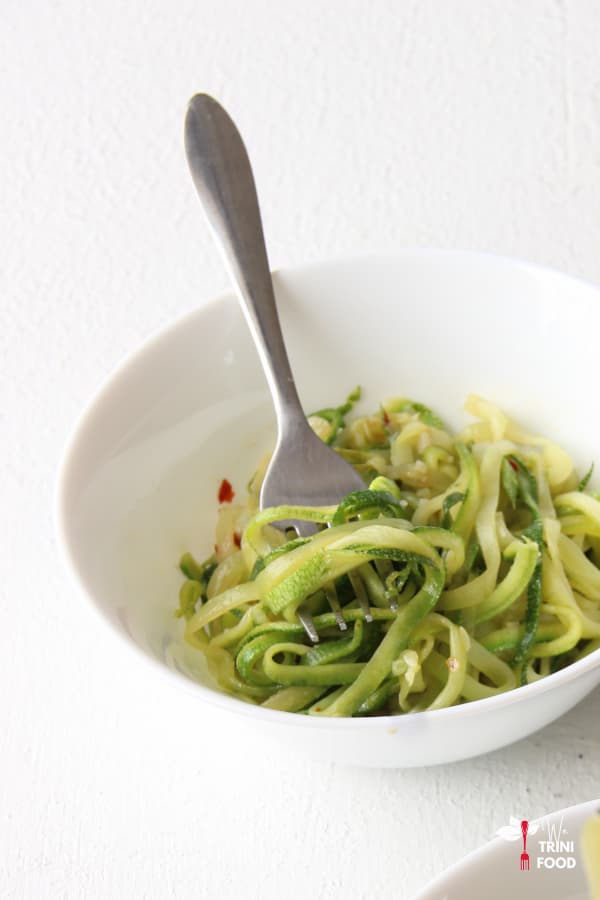 Zucchini noodles in a white bowl
