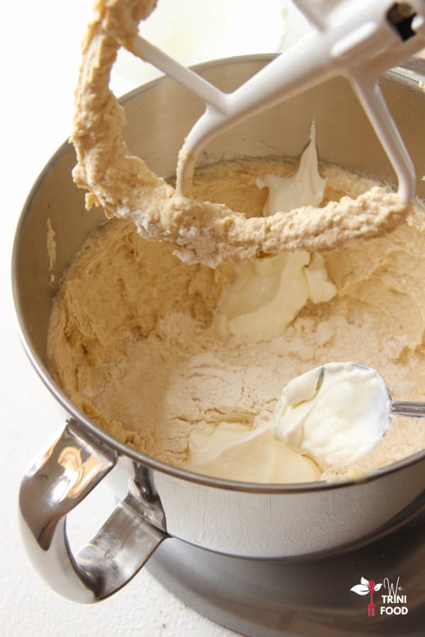 add flour and sour cream to mixer
