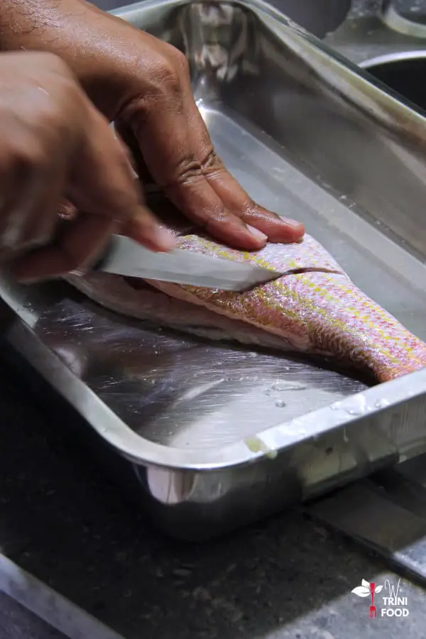 make slits in whole red snapper