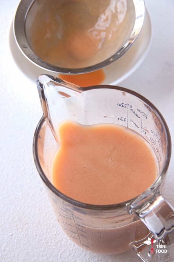 strained guava juice in jug