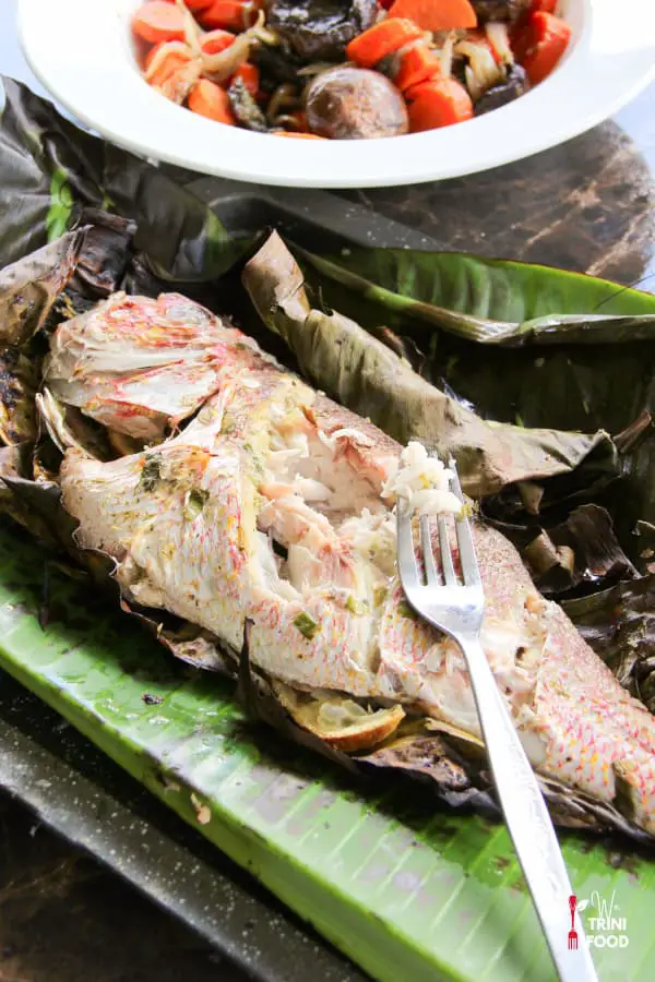 whole grilled red snapper and grilled vegetables