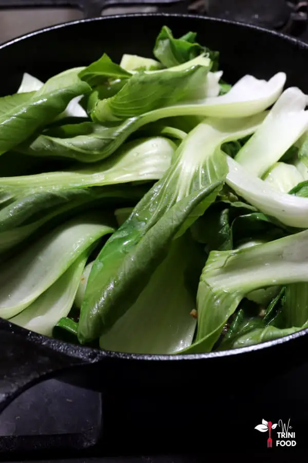 add bok choy to sauteed garlic and ginger