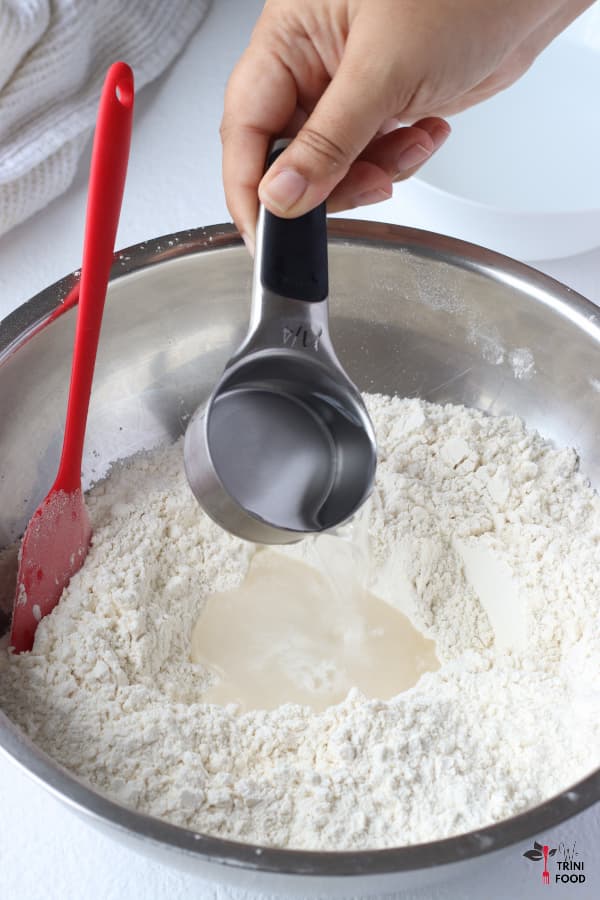 add water to dry ingredients for no knead bread