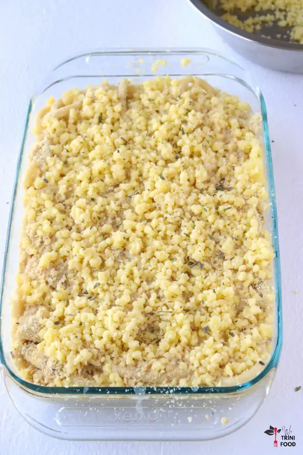 top cheese italian seasoning on macaroni pie