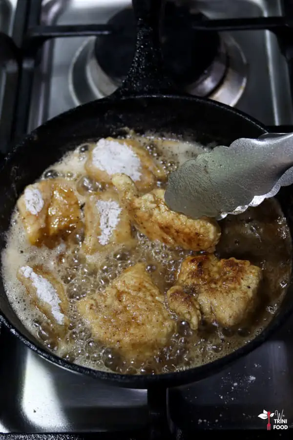 turn fried chicken bites in hot oil