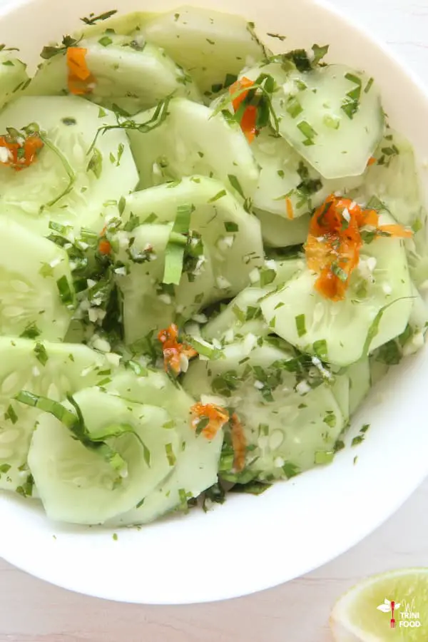 cucumber chow with pepper and lime wedge