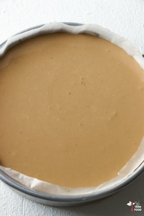 pour cheesecake filling into pan