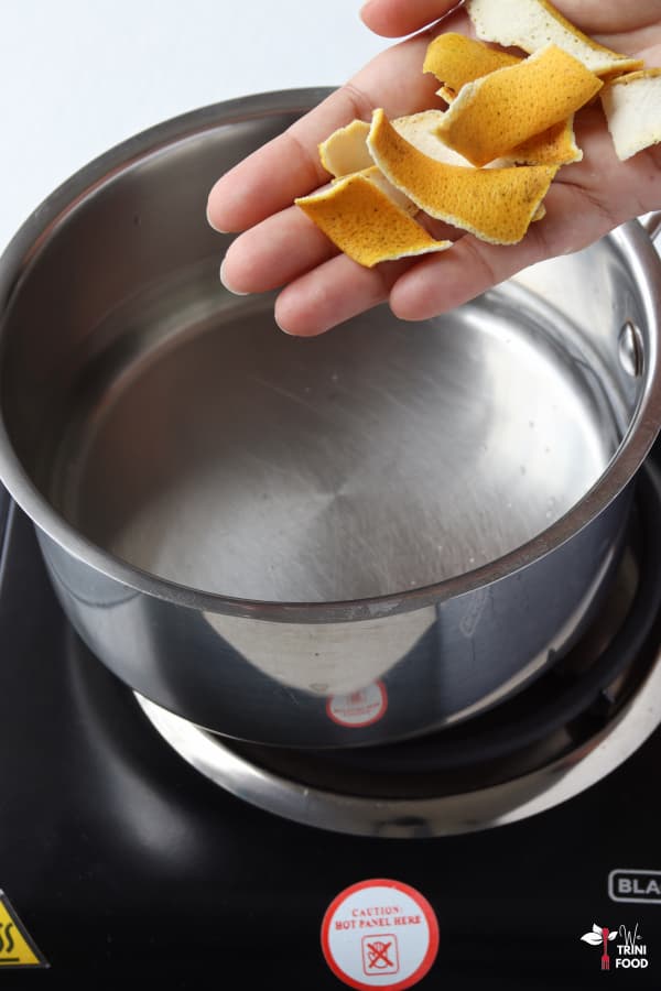 add dried orange peel to boiling water
