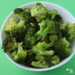 sauteed broccoli in white bowl