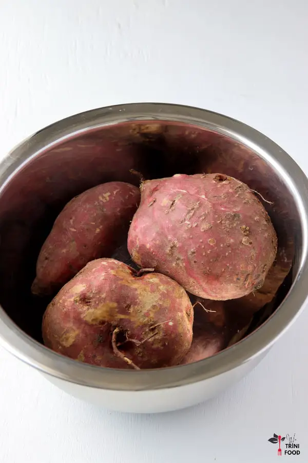 whole sweet potatoes in a bowl