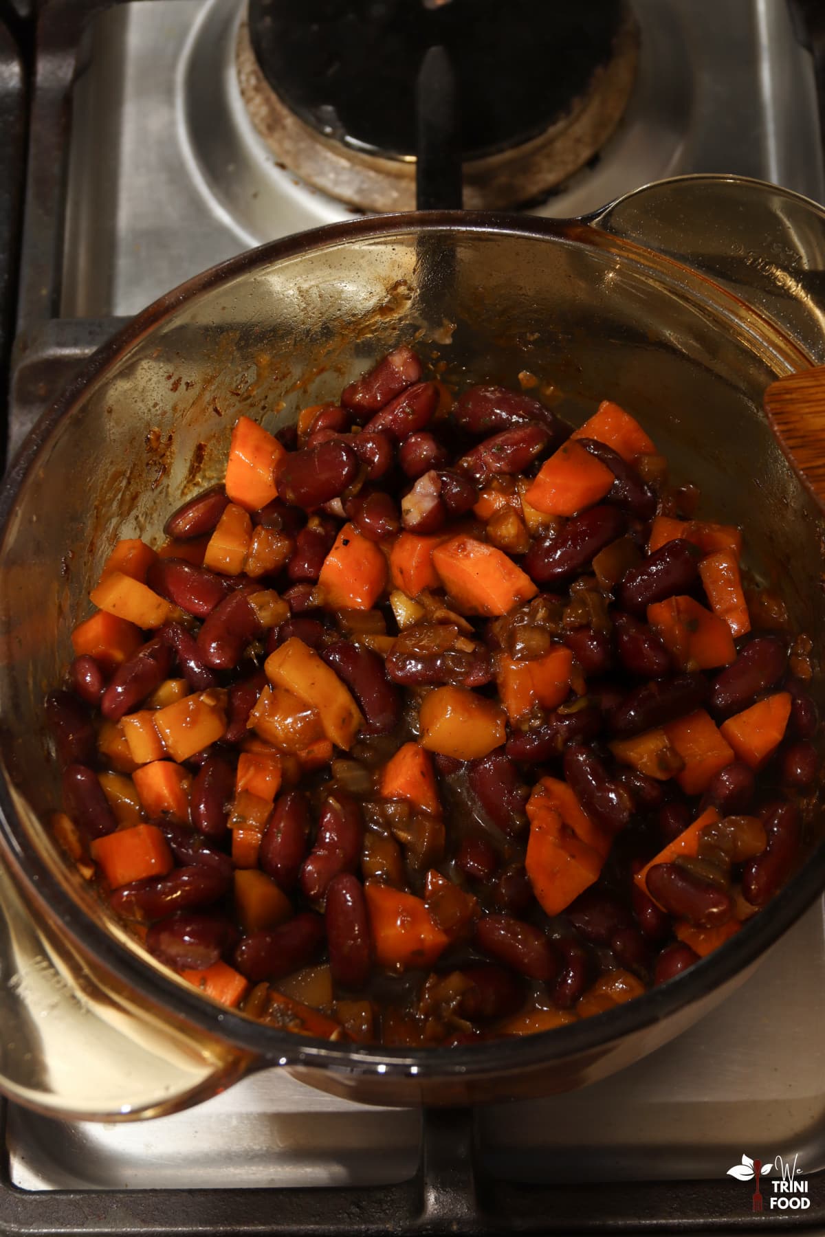 add ketchup and red beans for stewed red beans trini style