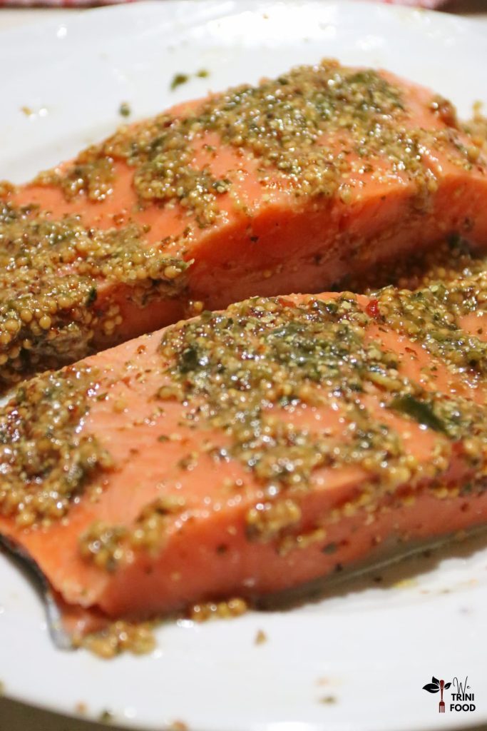 seasoned honey mustard salmon fillets on white plate