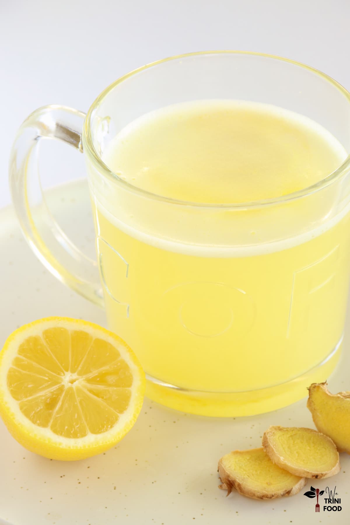 lemon ginger shots in a big cup
