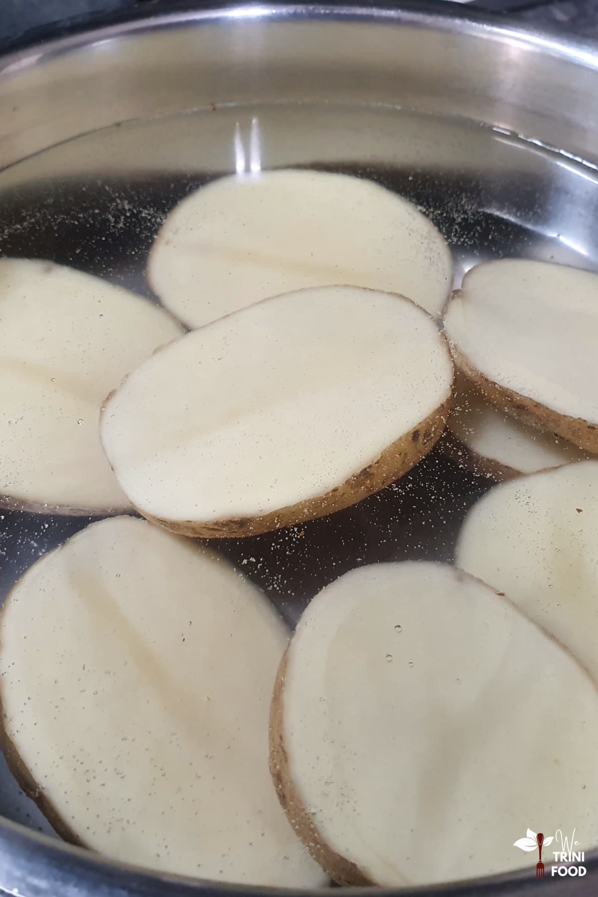 boiling potatoes for potato filling for aloo pie