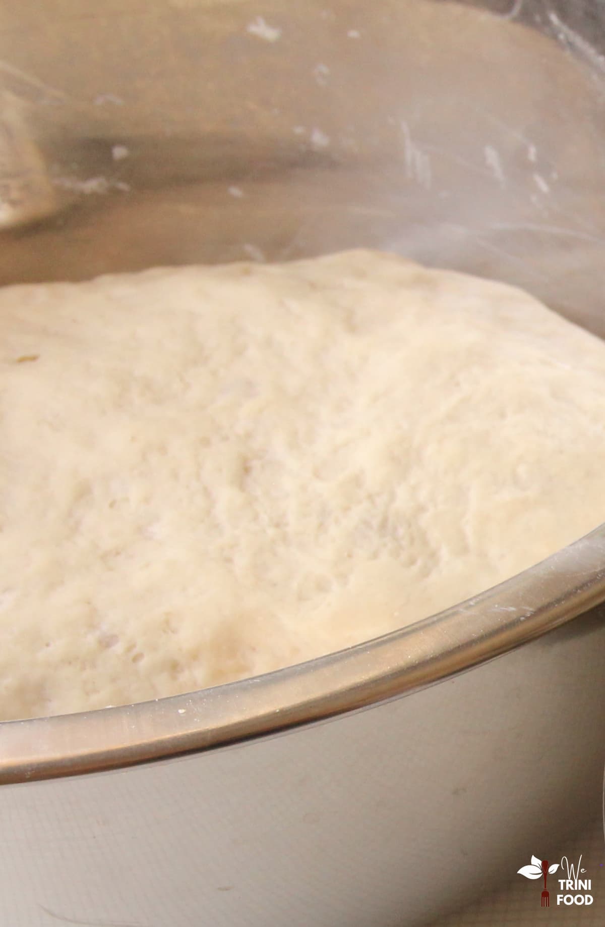 kneading dough for making aloo pie
