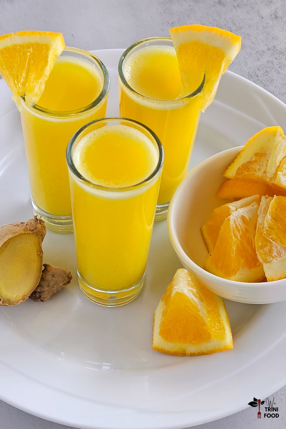 orange ginger shots in glasses