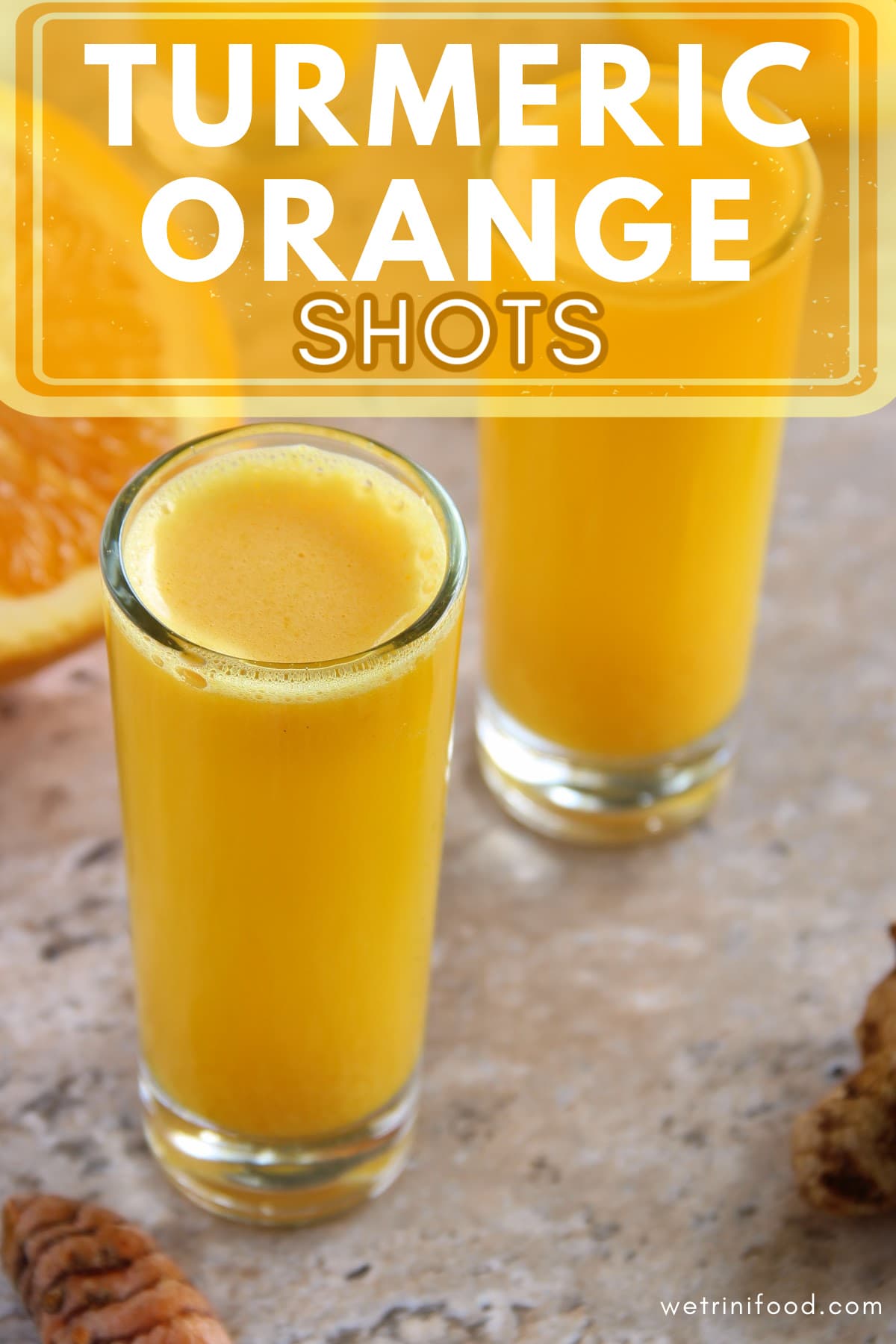 turmeric orange shots text overlay on a photo of turmeric orange shots
