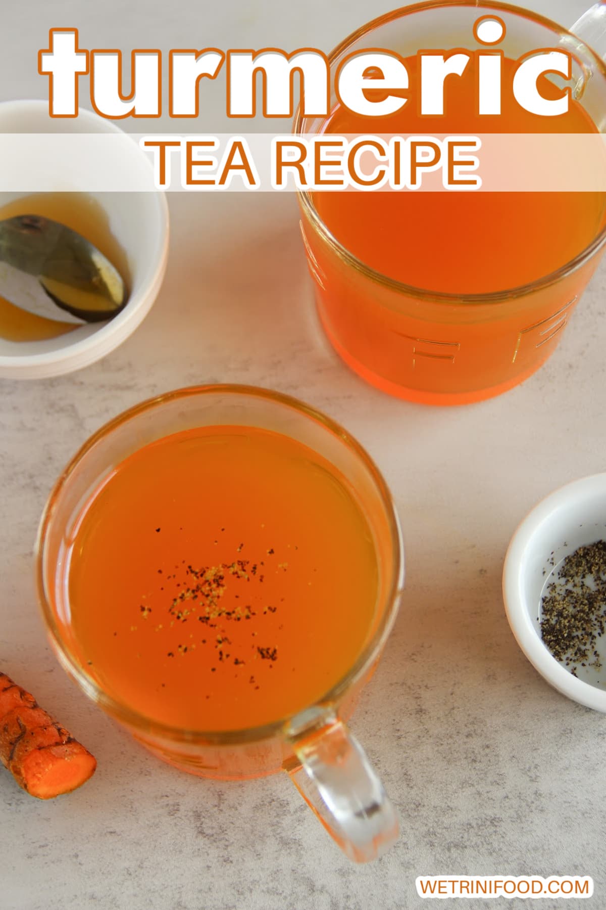turmeric tea recipe text overlay on a photo of 2 cups of turmeric tea