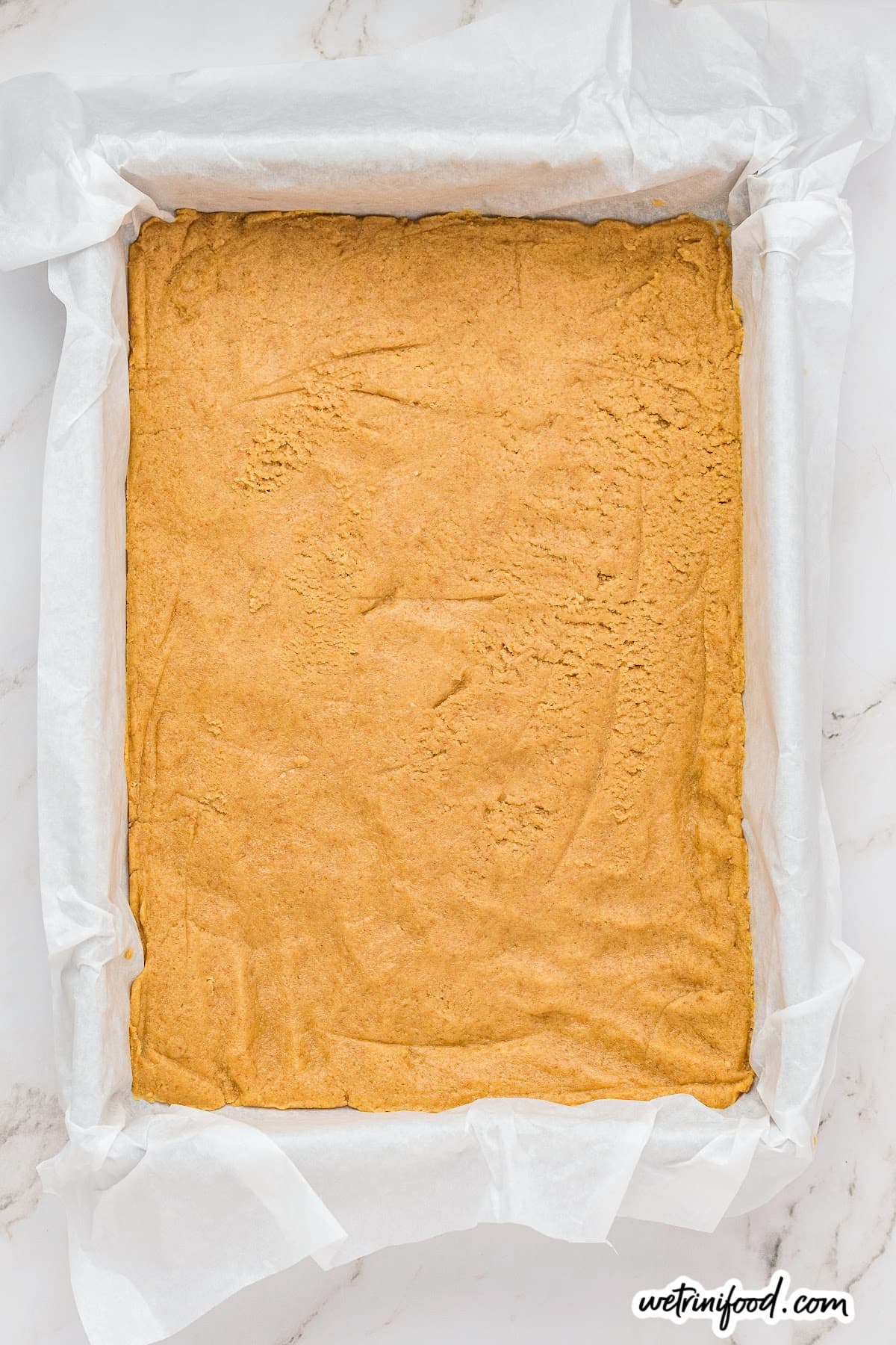 form cookie dough base for smores bars