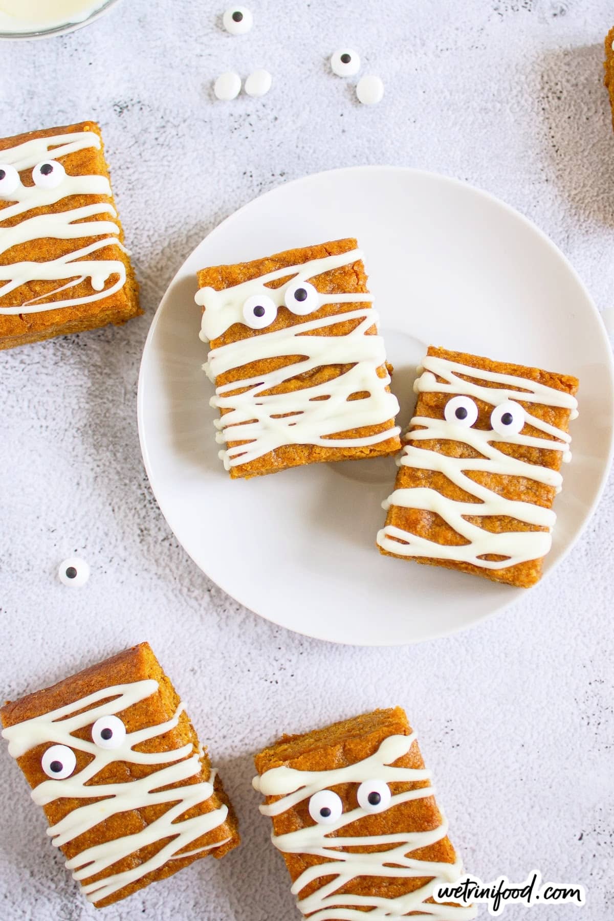 pumpkin mummy blondies with candy eyes and white chocolate