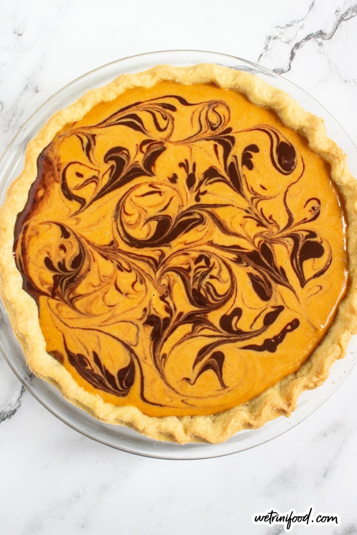 swirl in chocolate ganache in pumpkin filling