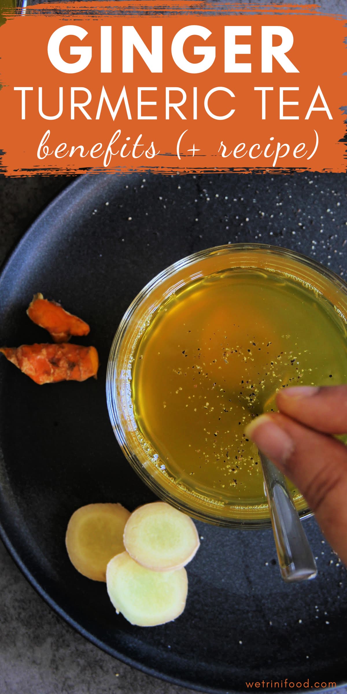 ginger turmeric tea benefits (+ recipe) text overlay on a photo of ginger turmeric tea with a sprinkle of black pepper on top