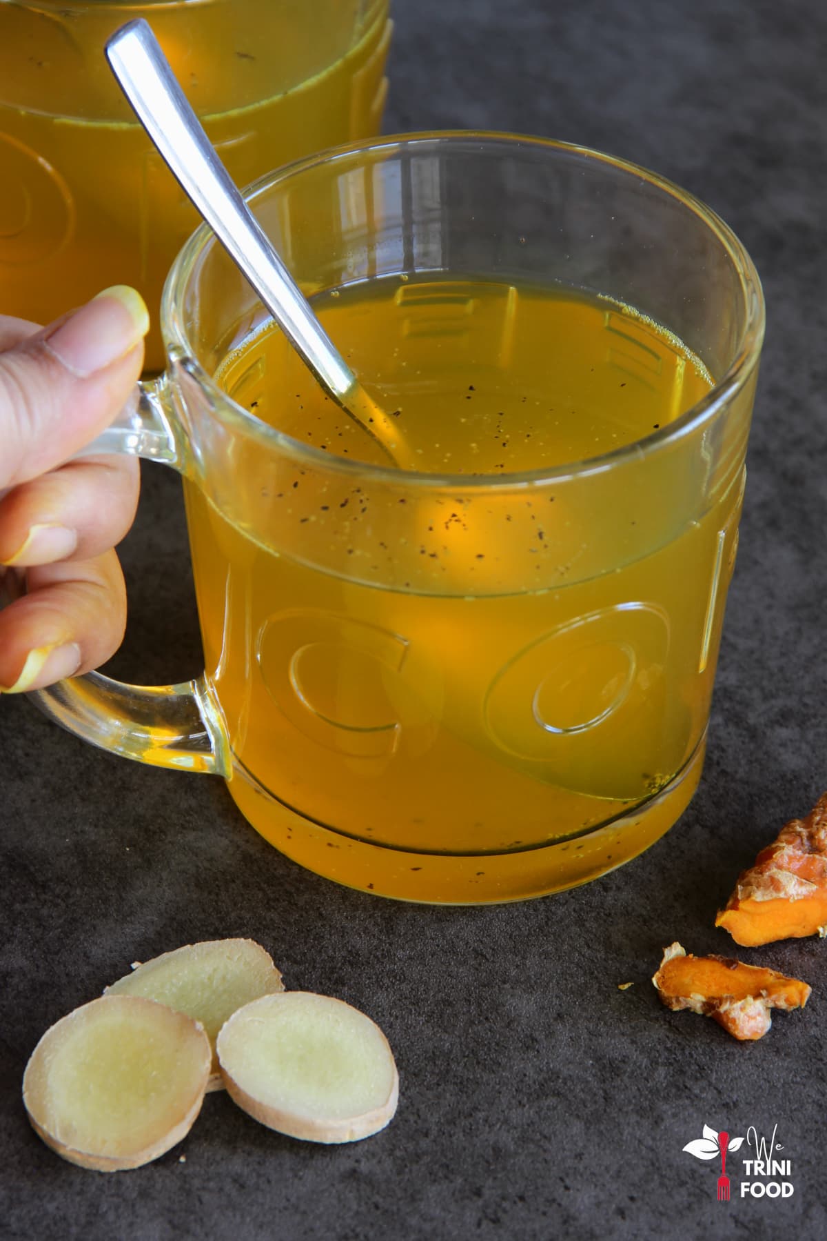 turmeric and ginger tea in glasses