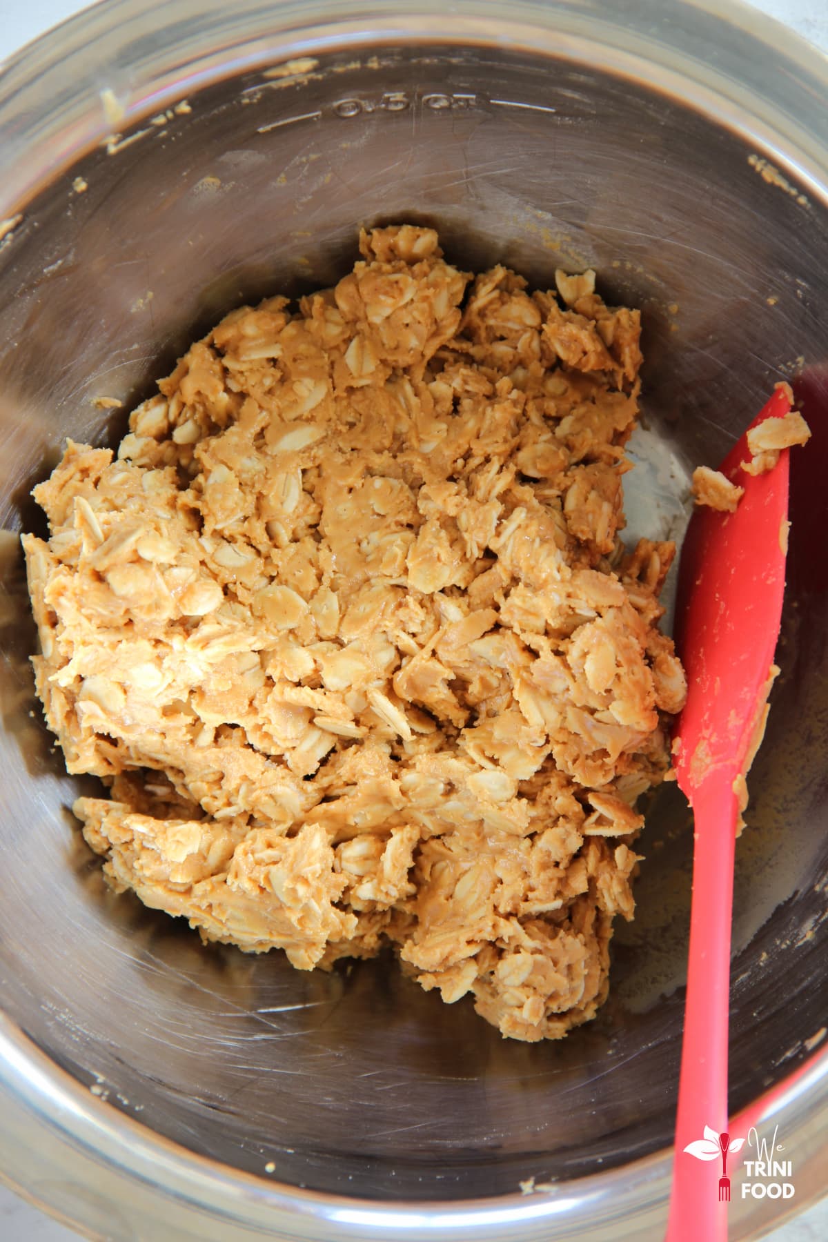 mixing peanut butter, oats and honey for oat peanut butter balls