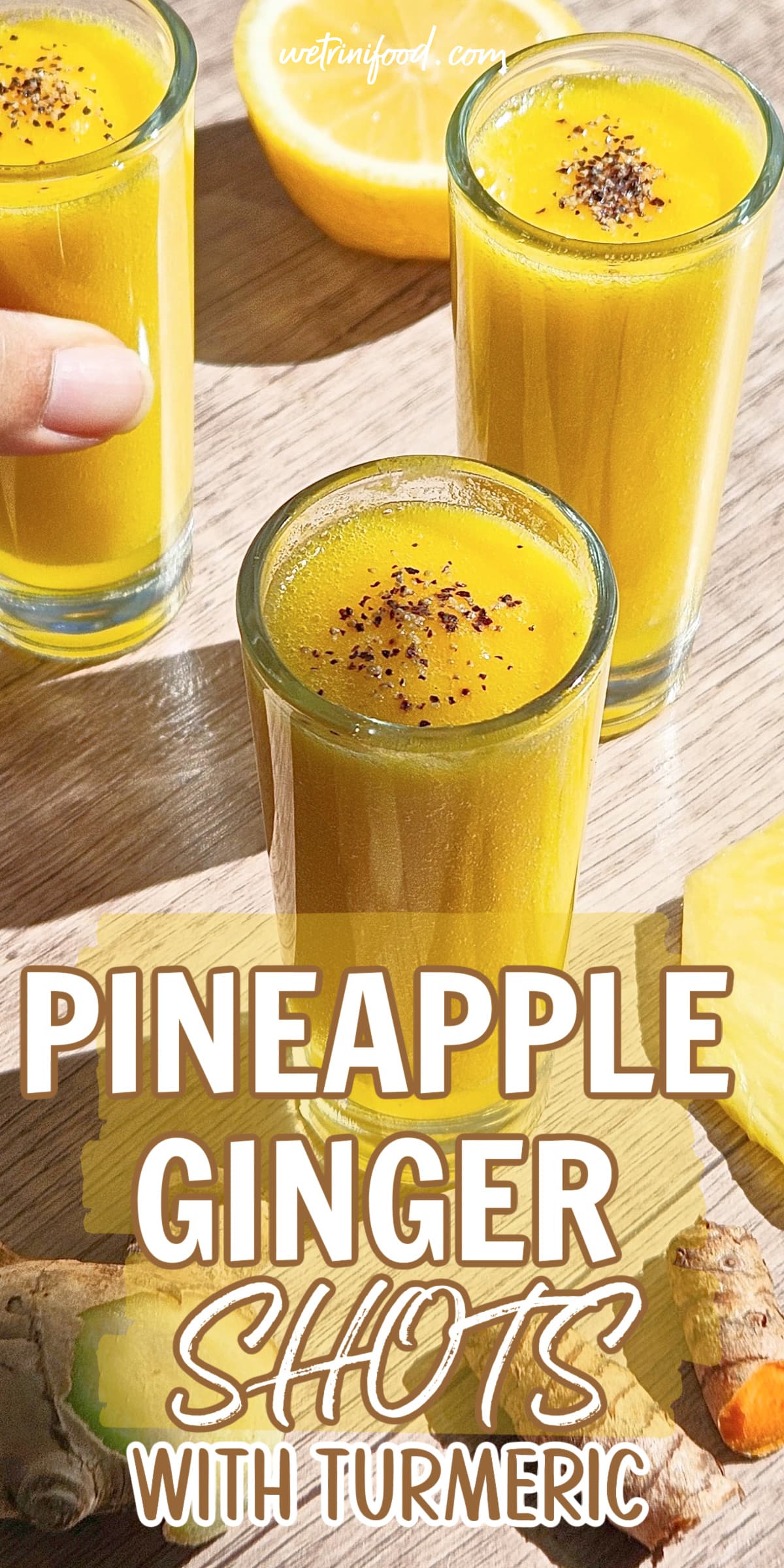 pineapple ginger shots with turmeric text overlay on a photo of pineapple turmeric ginger shots