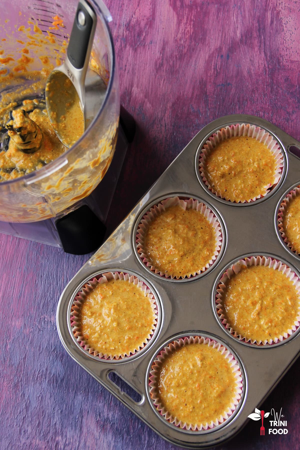 Carrot oat muffins batter in muffin cup liners