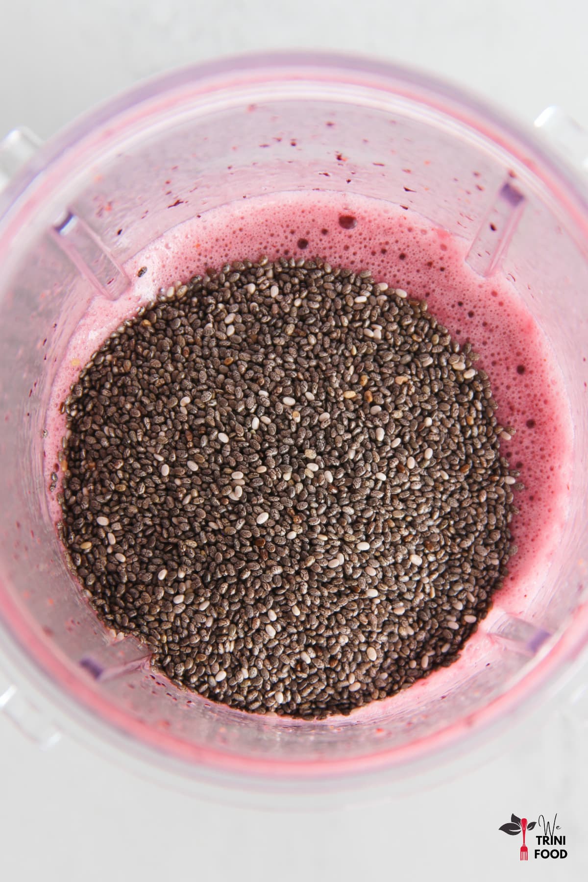 chia seeds added to blueberry blended for chia pudding