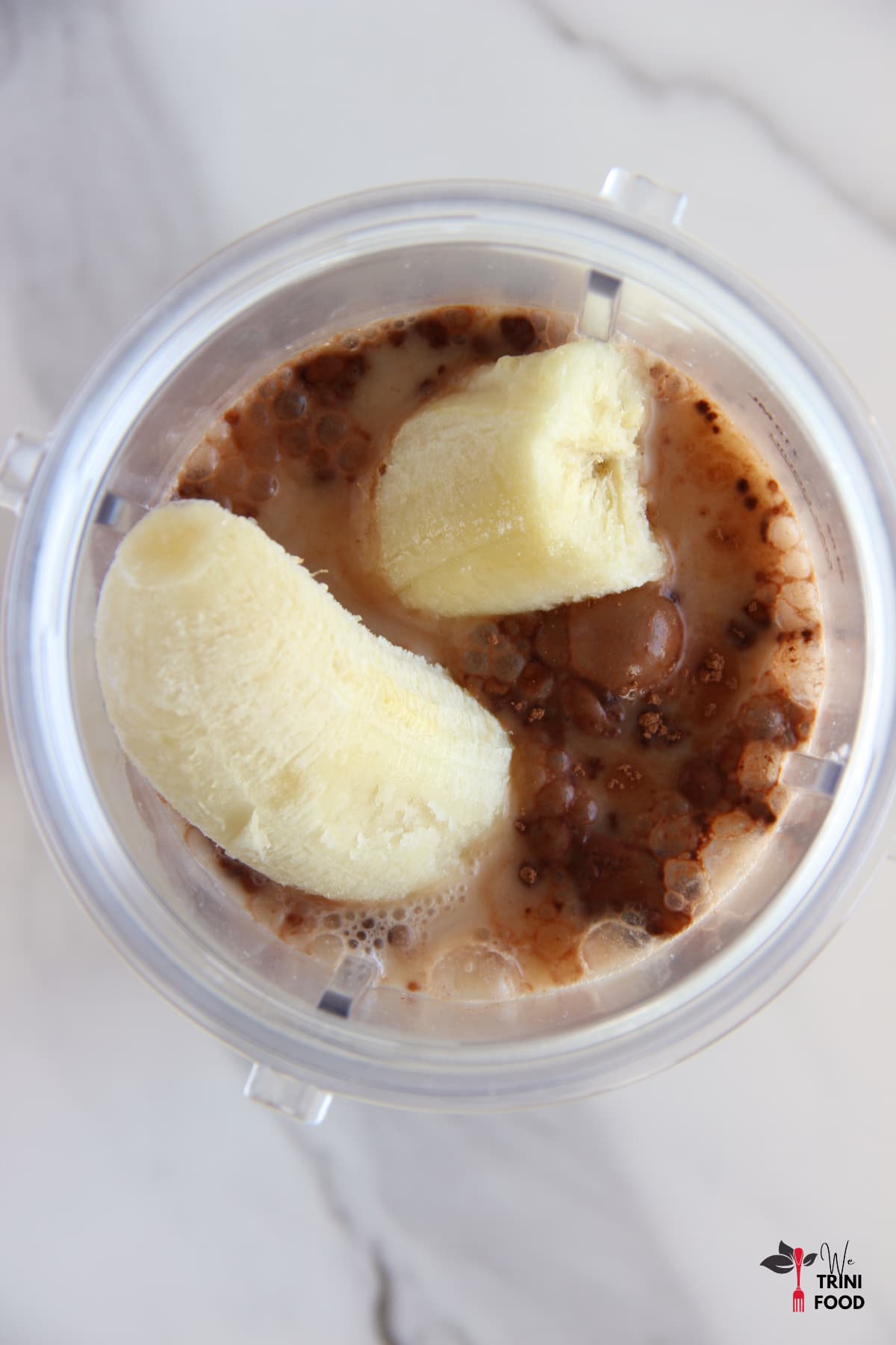 Blend ingredients for chocolate banana smoothie