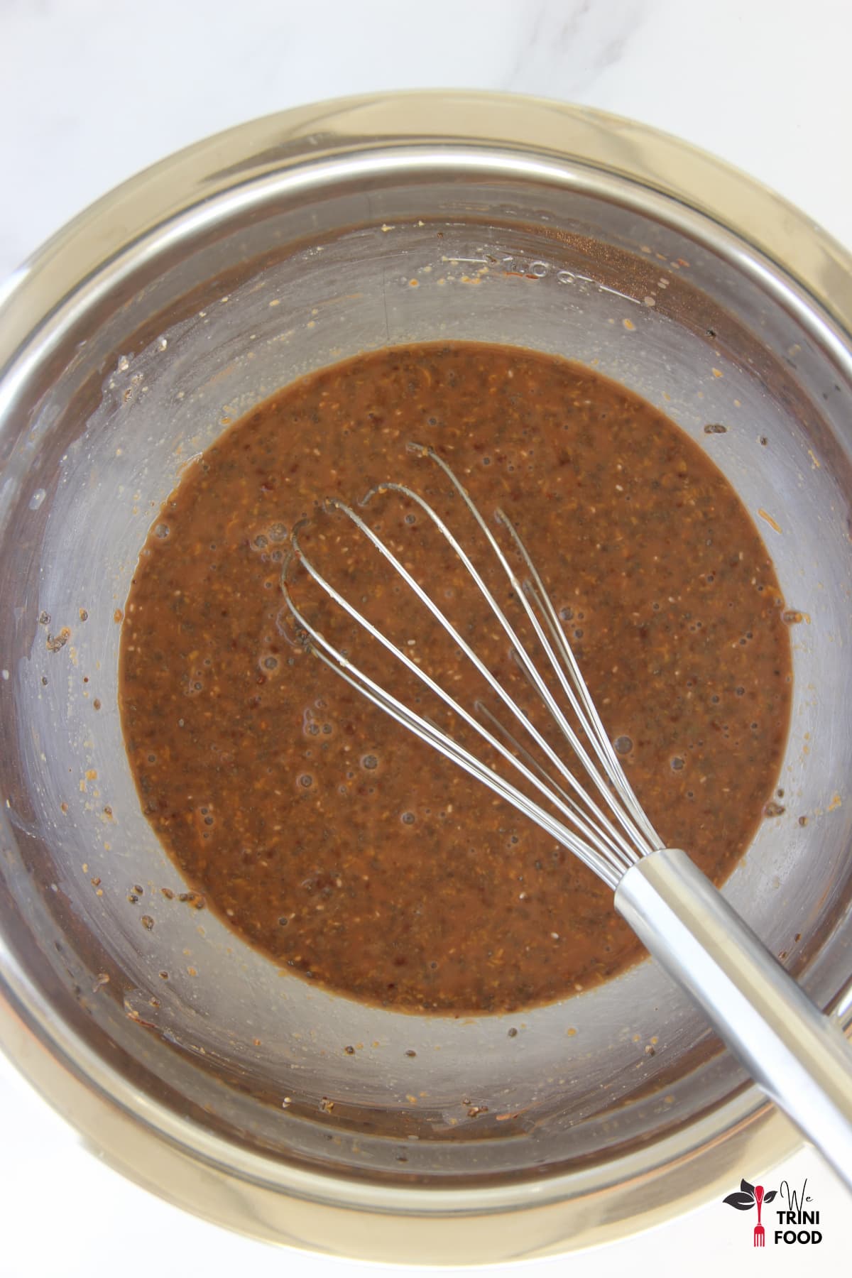Mixing chia seeds with cocoa and peanut butter for chocolate peanut butter chia pudding