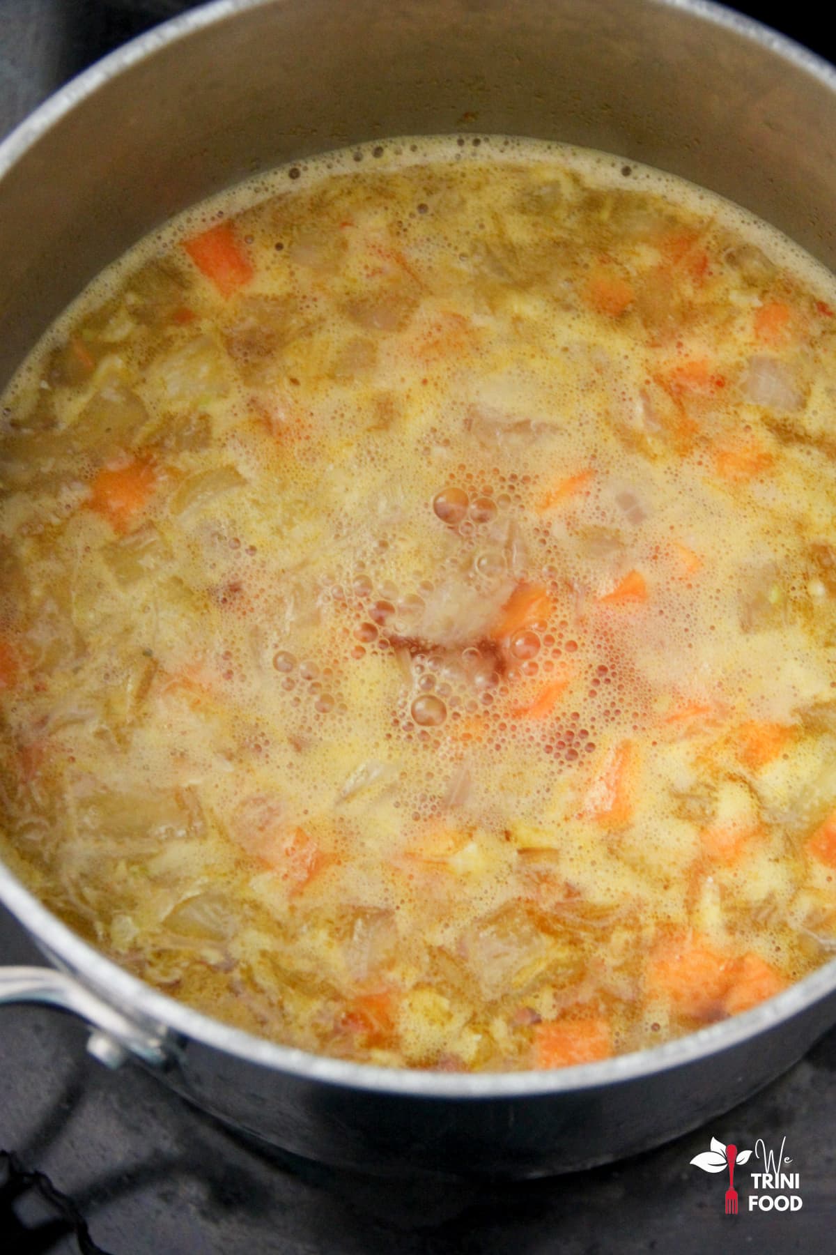 Front on boiling carrot ginger soup