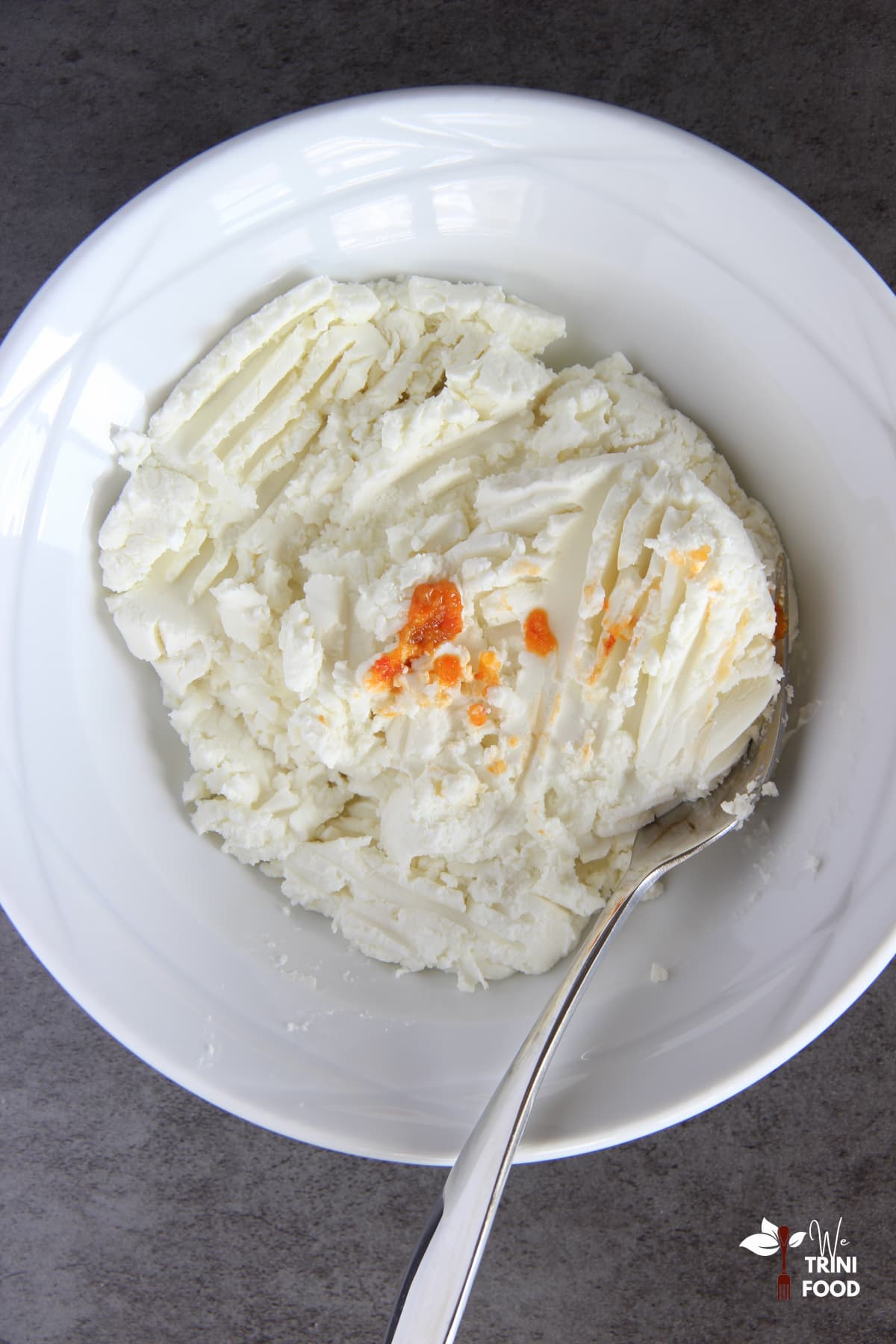 Fried Goat Cheese Balls: Mixing Soft Goat Cheese with Pepper Sauce