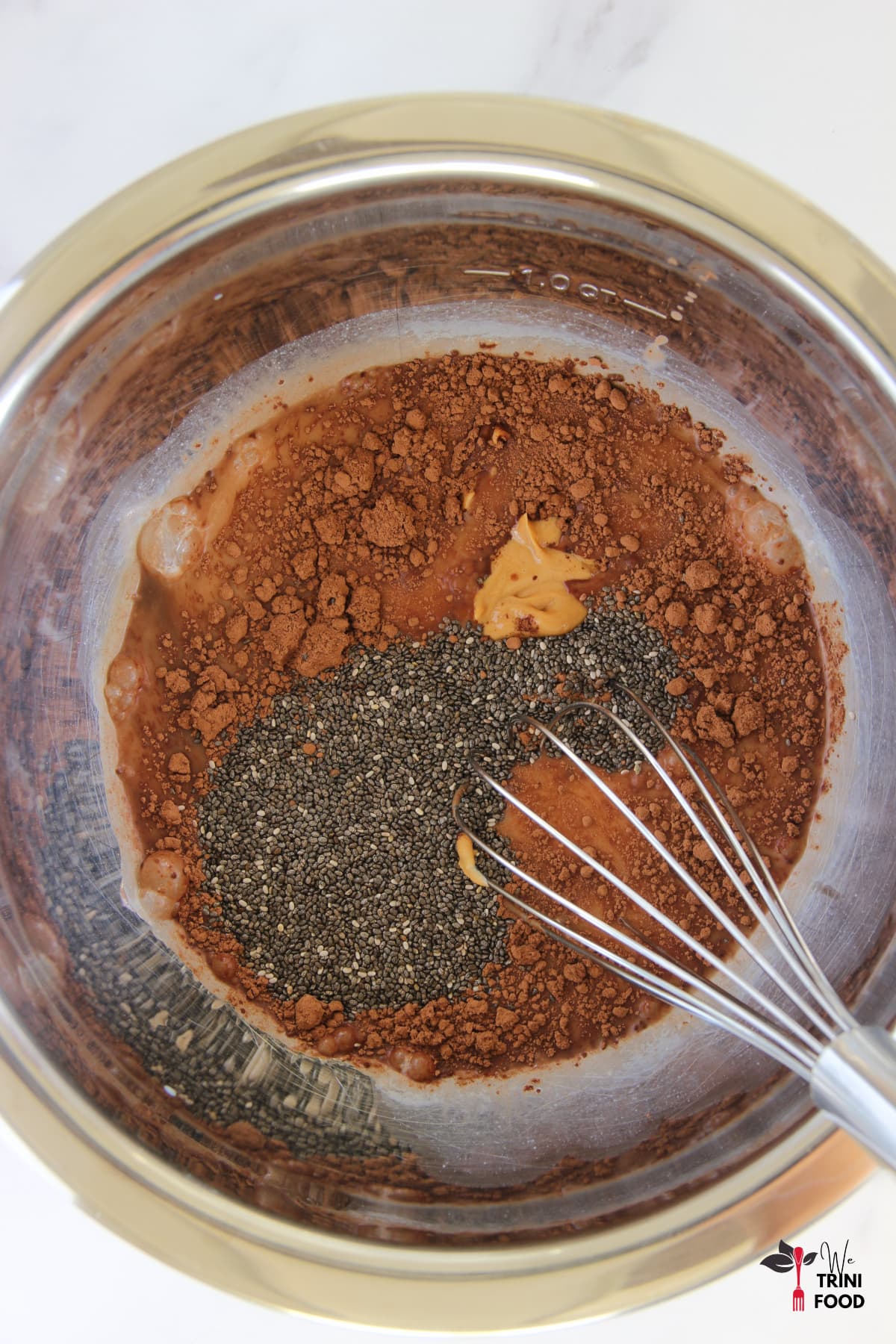 Chocolate peanut butter chia pudding ingredients being mixed