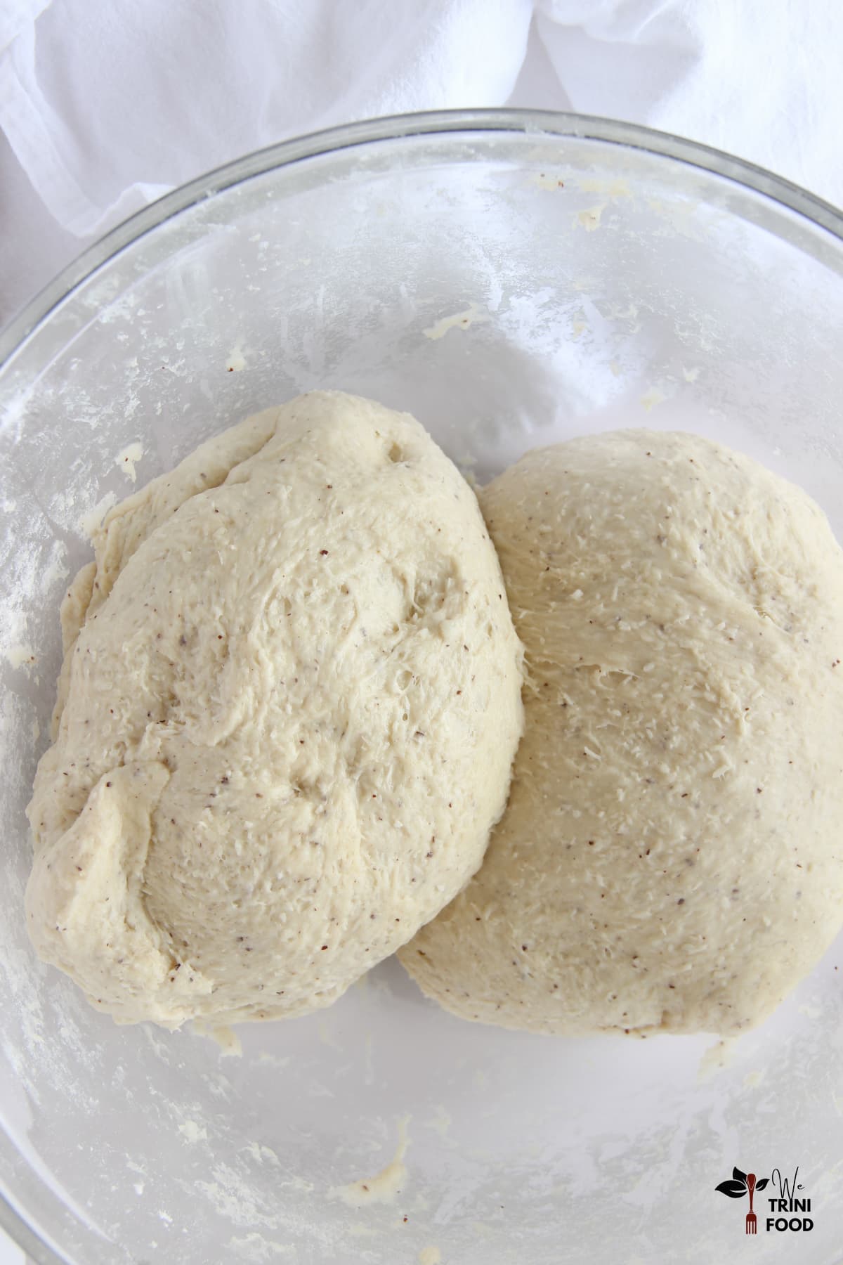 Divide dough into two coconut bakes