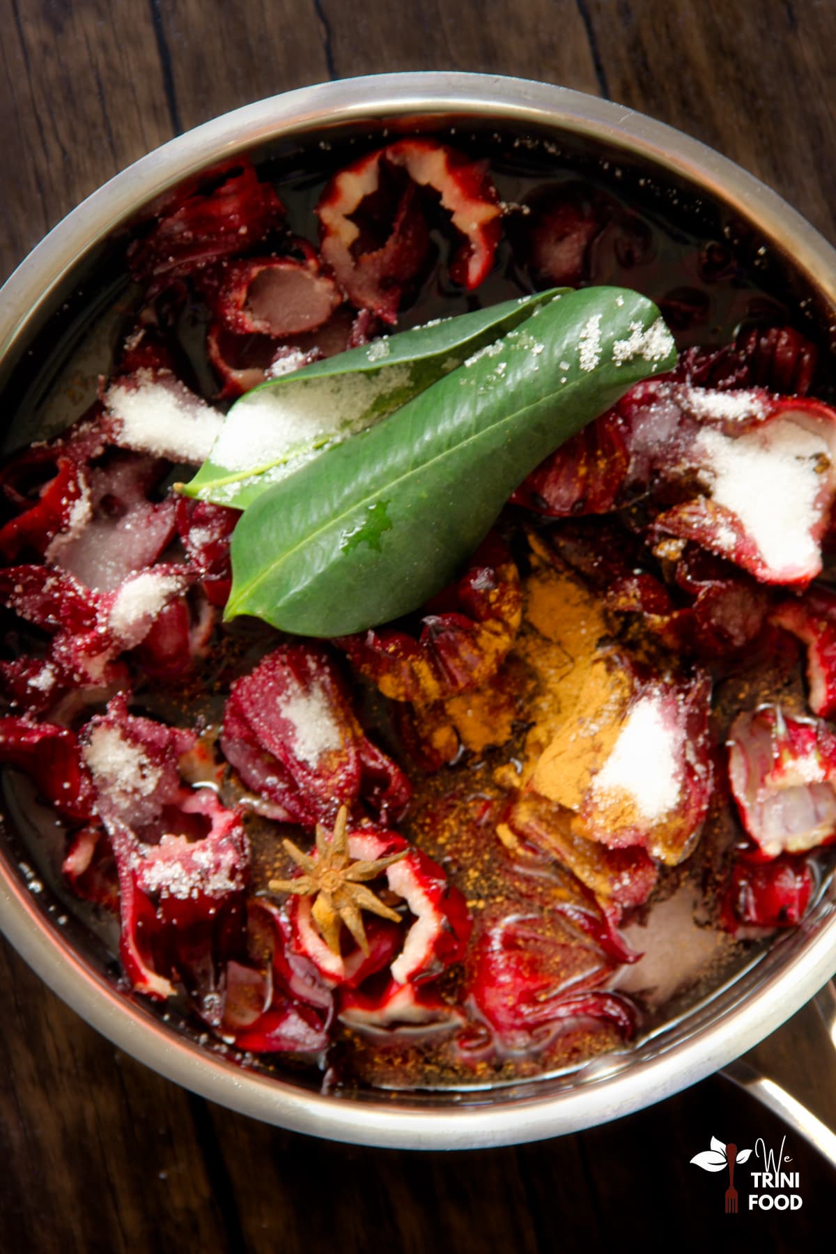 Adding sorrel drink ingredients to make sorrel juice